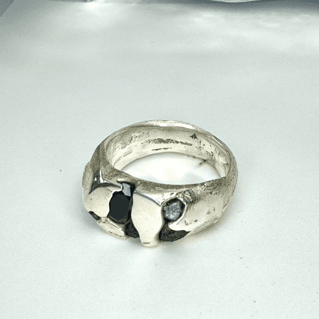Sand cast emerald and sapphire ring